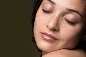 Woman with freckles on her face