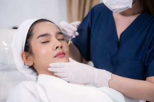 Doctor administering fillers for the patient